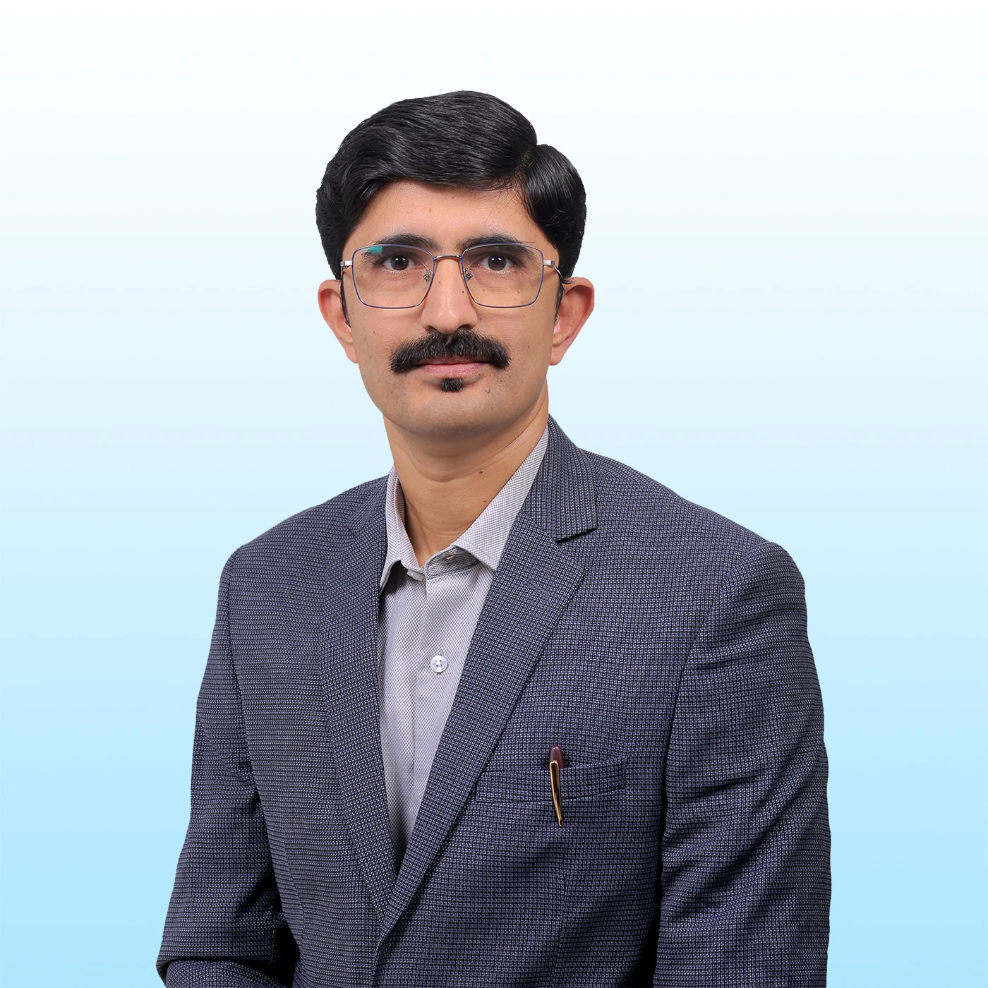 Dr. Dharak Dholakia